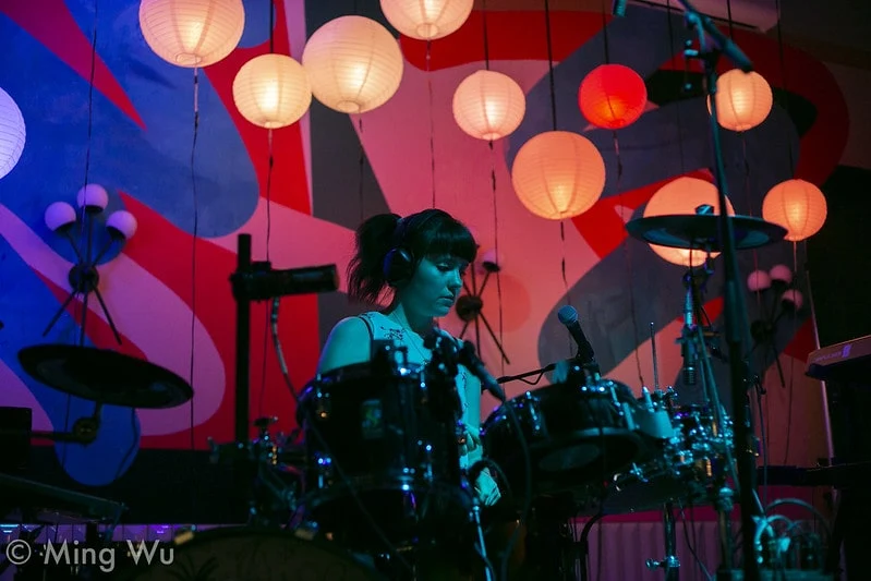A drummer on stage at Queen St. Fare. Photo © Ming Wu; original image credit retained.